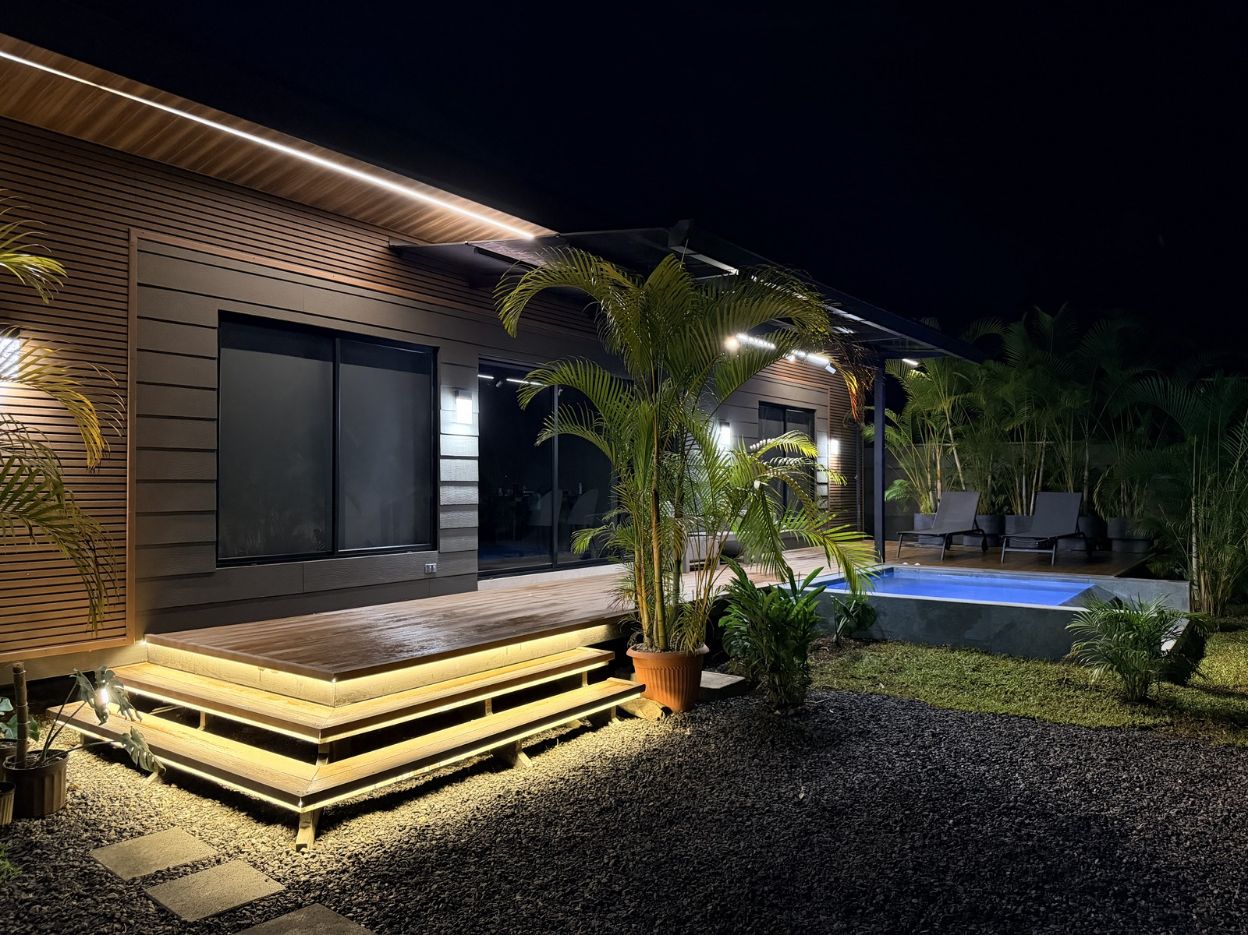 Casa Selva Rosa illuminated at night with its private heated pool